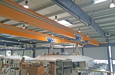 Double-girder travelling crane in the prototype assembly area at Construction Navale Bordeaux.