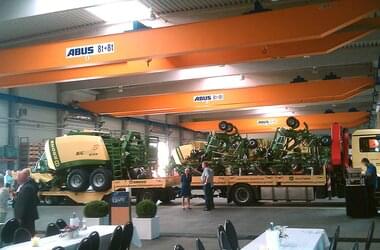 several ABUS cranes with electric wire rope hoist in production hall of Krone company in Lower Saxony, Germany