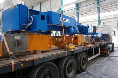 ABUS crane with a lifting capacity of 80 t is delivered to storage area for wind turbine components