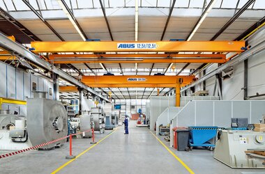 Overhead travelling cranes in newly built production hall of the Piller company