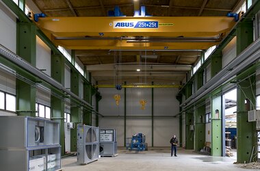 Double girder travelling crane with two wire rope hoists in new hall in Finland