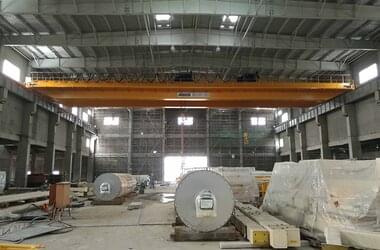 Double girder travelling crane with travelling platform in production hall of Longchen Paper Group company