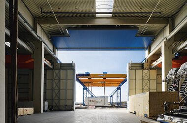 Open hall in Sonsbeck with double girder travelling cranes 