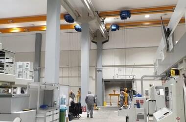 4 single girder travelling cranes with lifting capacity of 3.2 t in production hall of Aluflexpack company